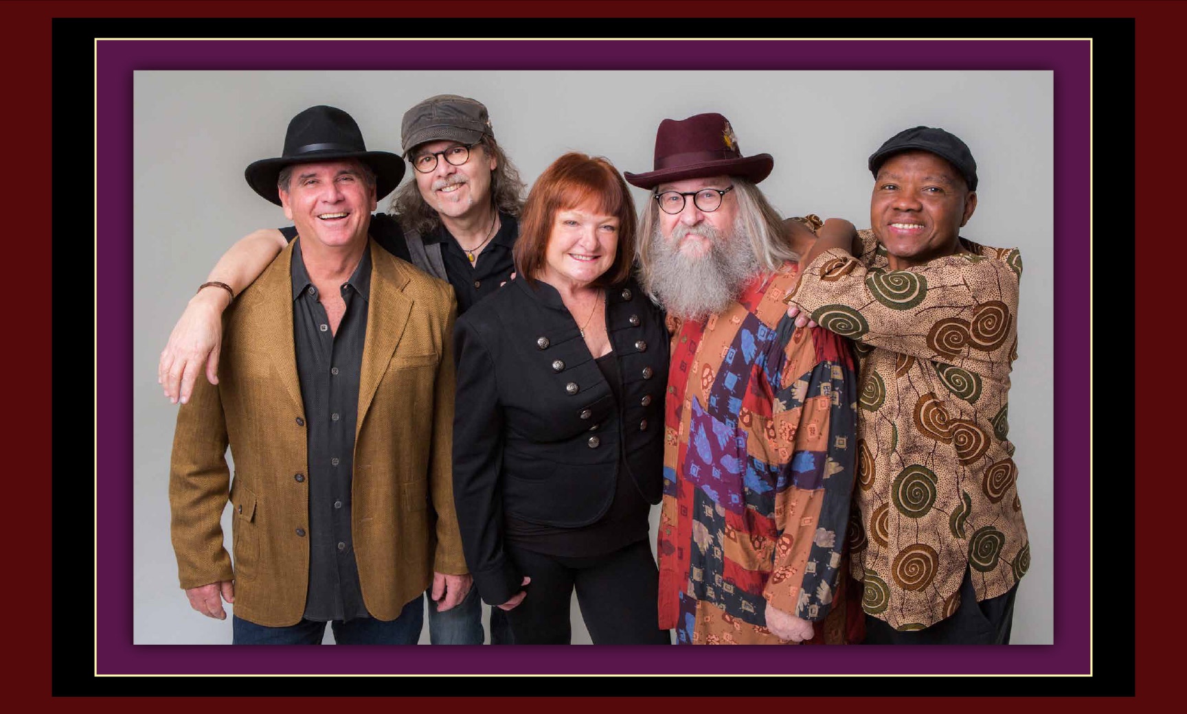The five members of Solares Band, arm in arm